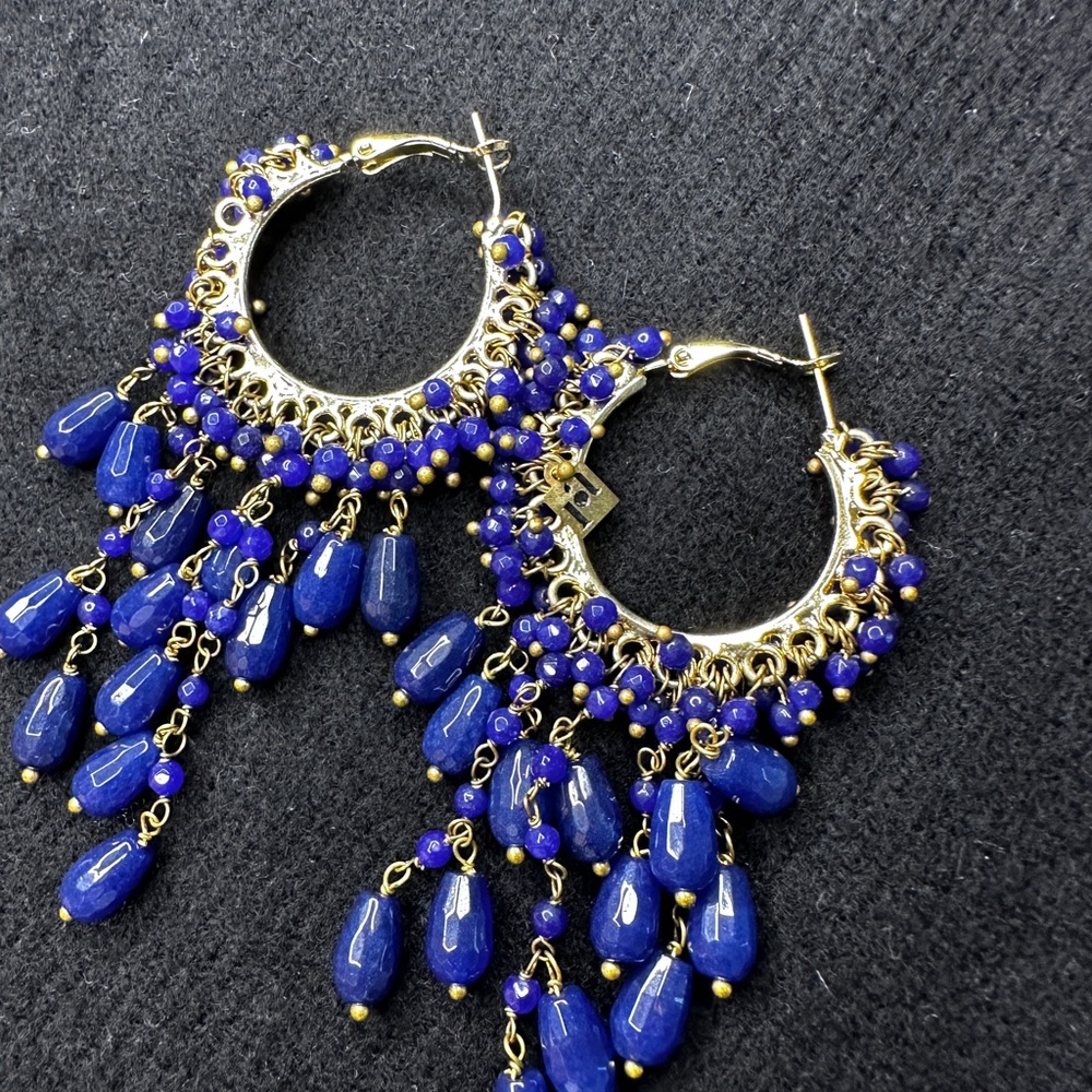 ra gold with blue stone earrings